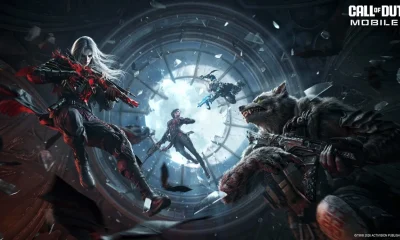 Key art resmi Call of Duty Mobile Season 9 Vampires vs Werewolves: vampir dan werewolf bertarung di udara di bawah jendela bundar